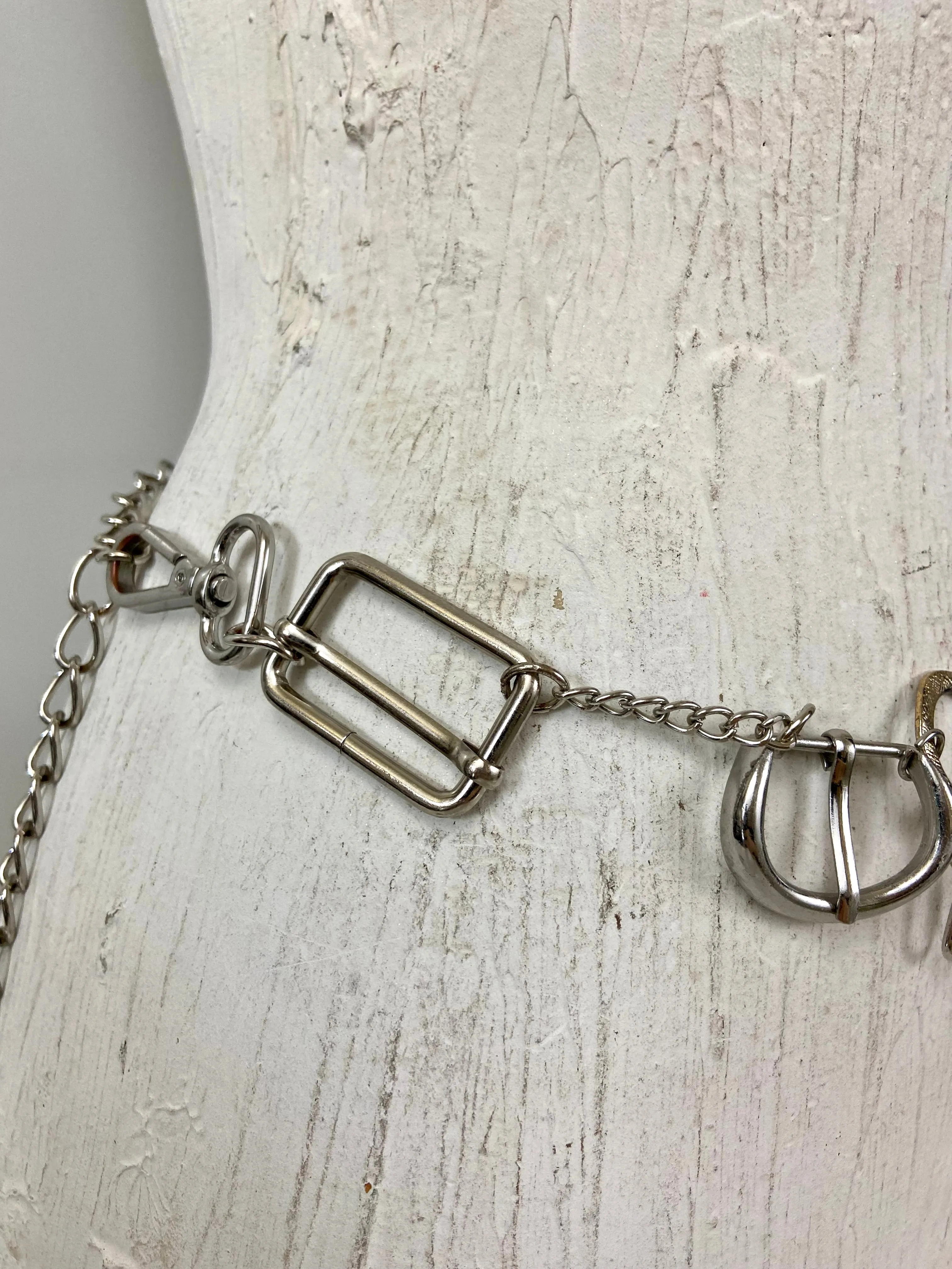 Lots of toys in a chain belt
