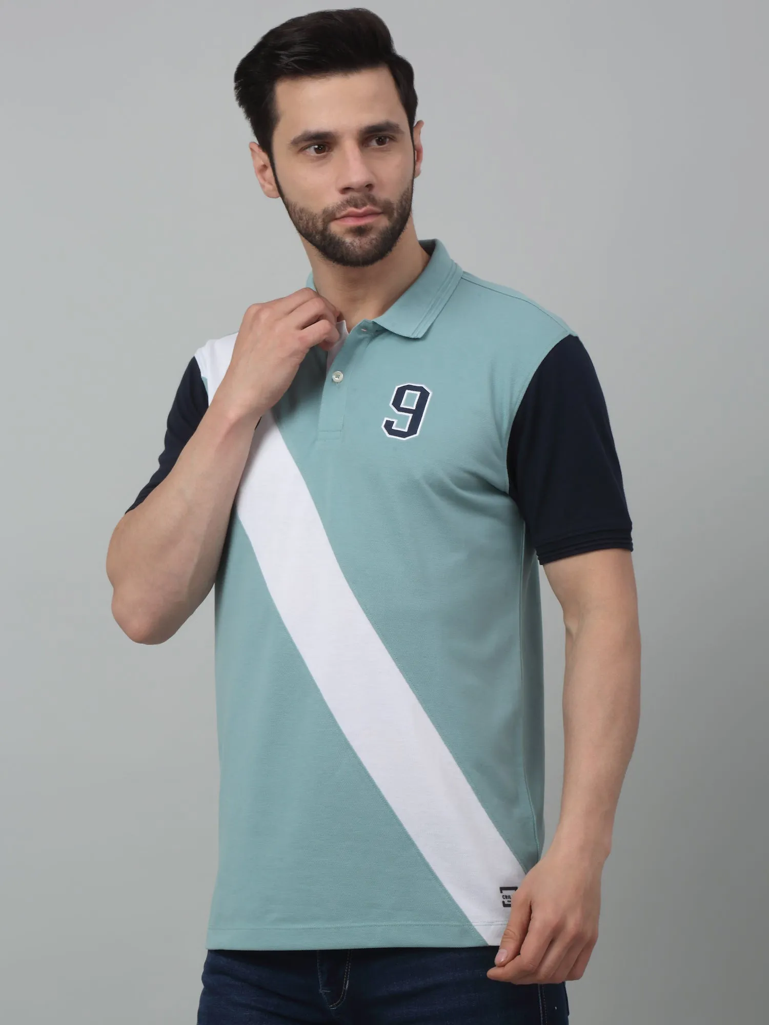 Men's Aqua Green Color block Polo neck Half Sleeve T-Shirt with Diagonal color block at front & sleeve in contrast.